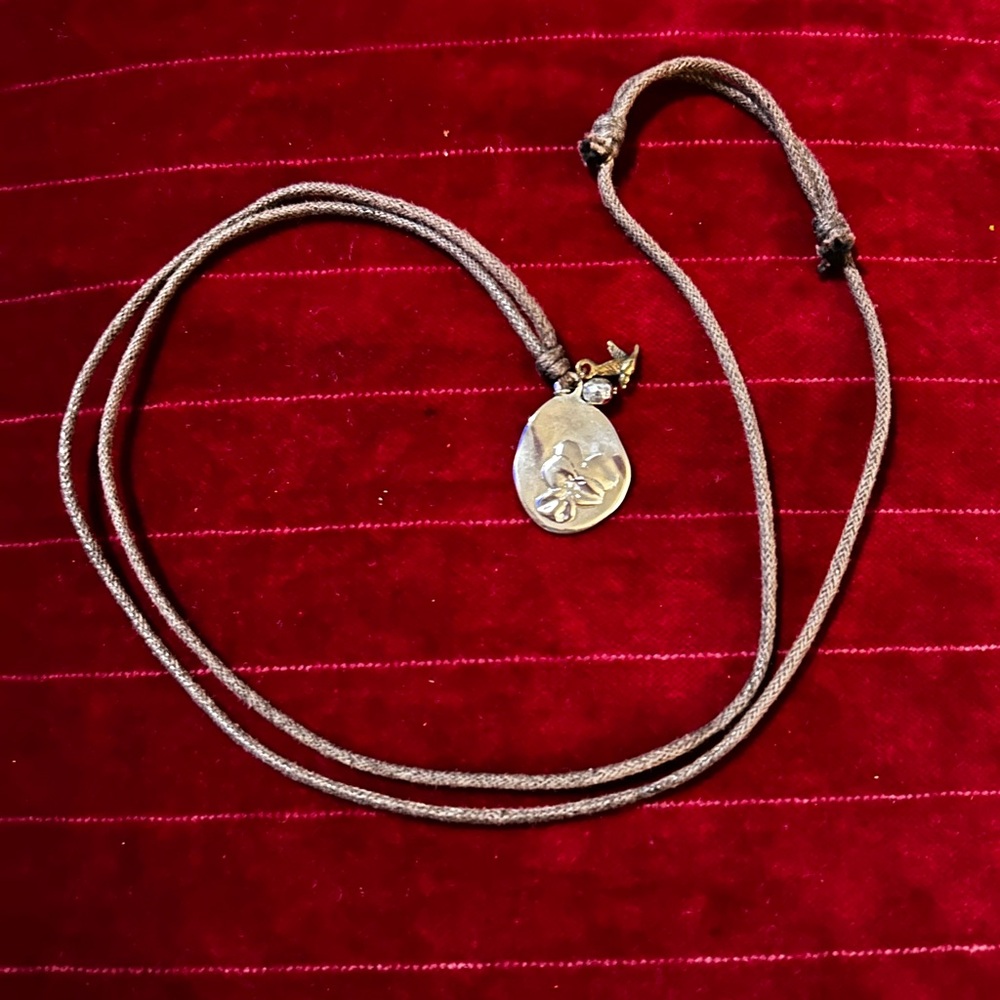 Silver/gold tone Pendant Necklace with charms.
